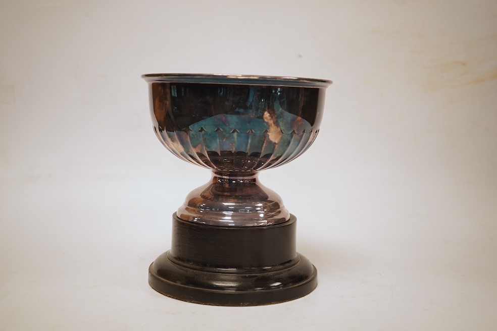 A George VI demi-fluted silver rose bowl, by Walker & Hall, Sheffield, 1939, diameter 14.4cm, 7.2oz, on an ebonised socle.